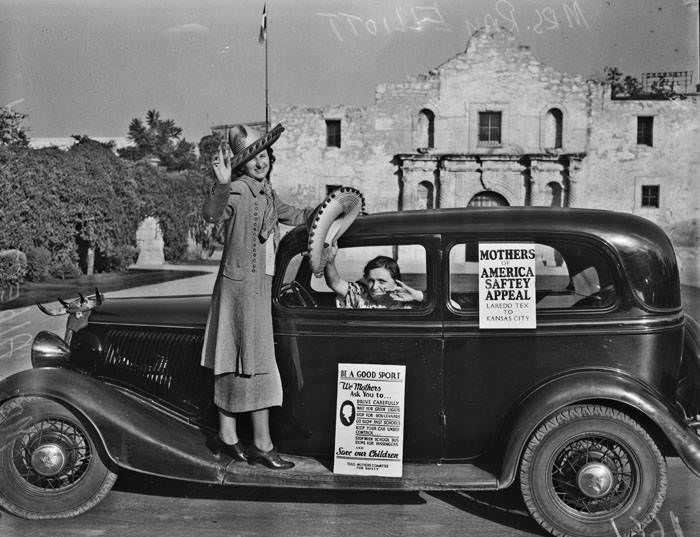 Mrs. Ray Elliott and Mrs. Albert Robey in car in front of the Alamo, 1937