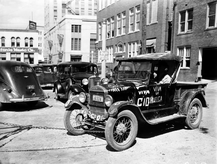 1927 Ford Roadster pickup truck decorated with slogans supporting the pecan shellers' strike, 1938