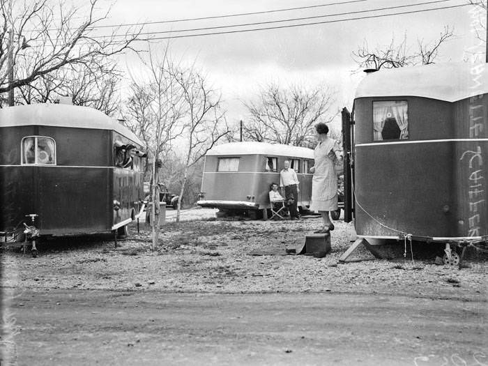 Women in travel trailer encampment, 1939