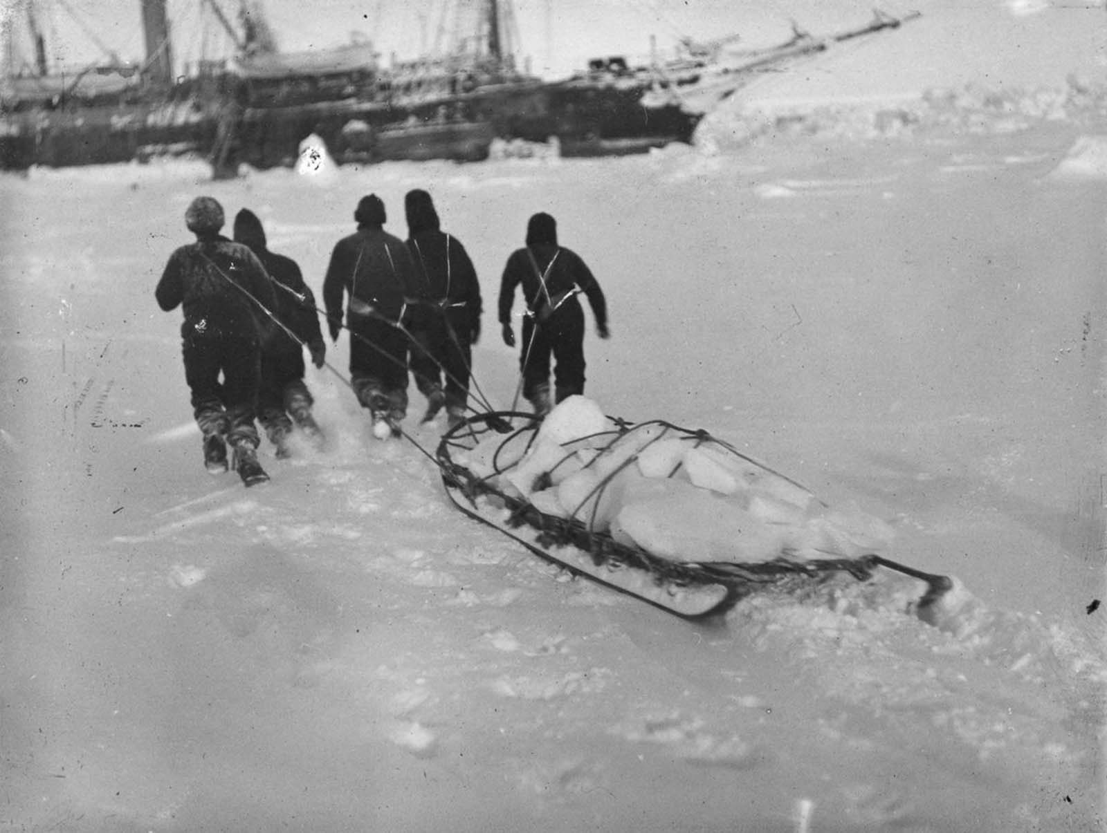 Crew retrieve fresh ice to use for water.