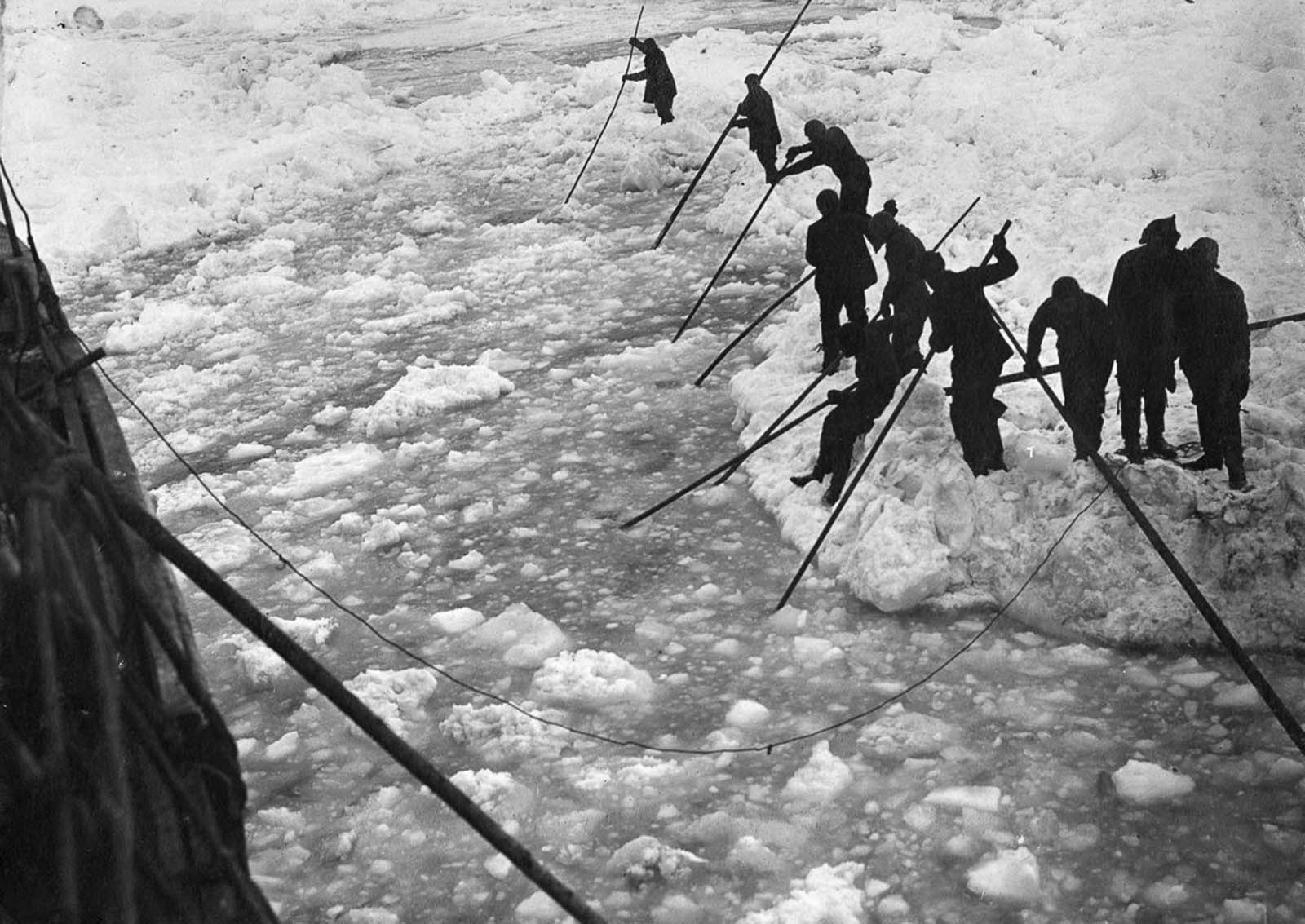 Crew attempt to clear a path through the ice for Endurance.