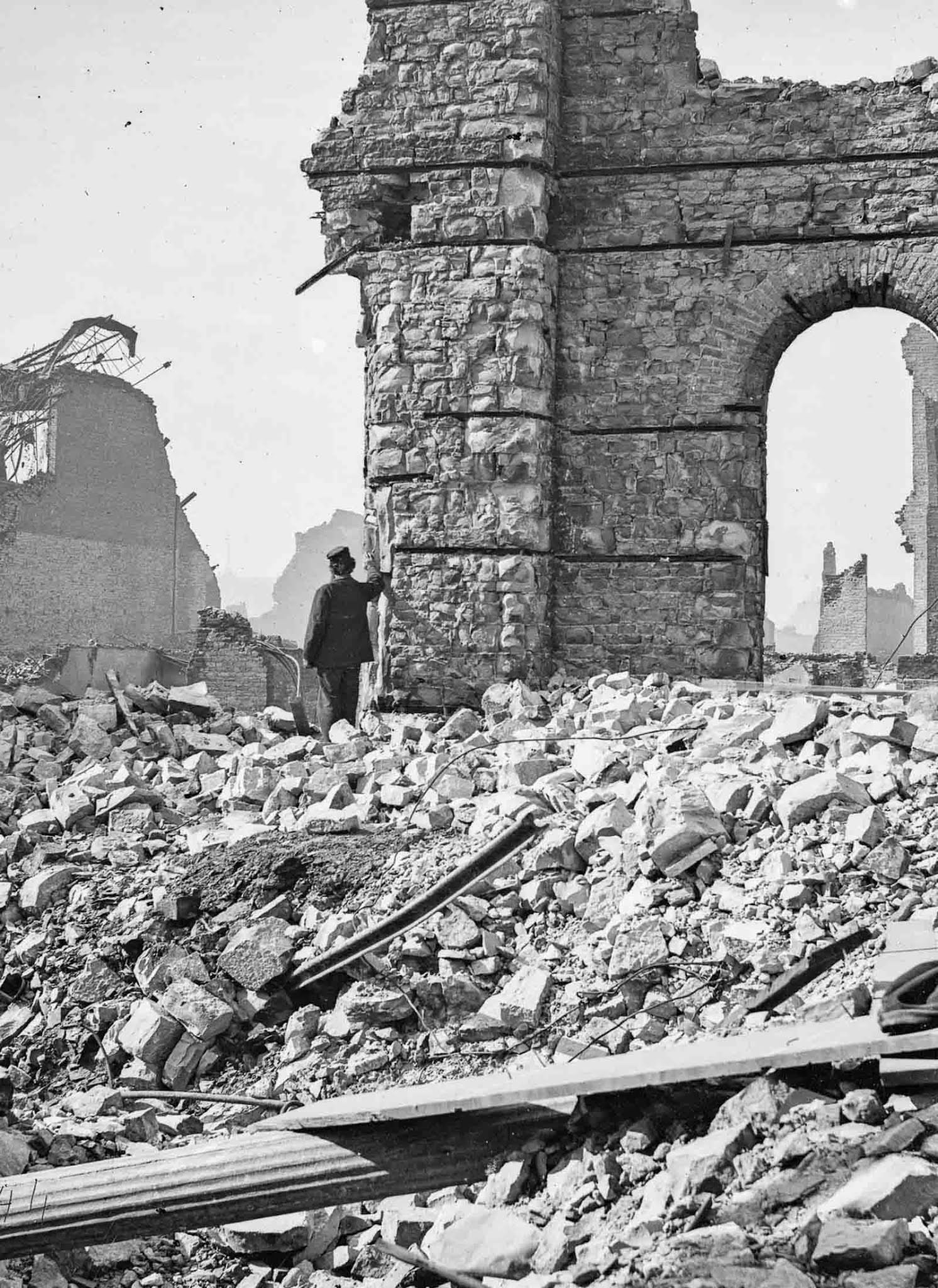 A man stands amid the ruins of the Union Depot.