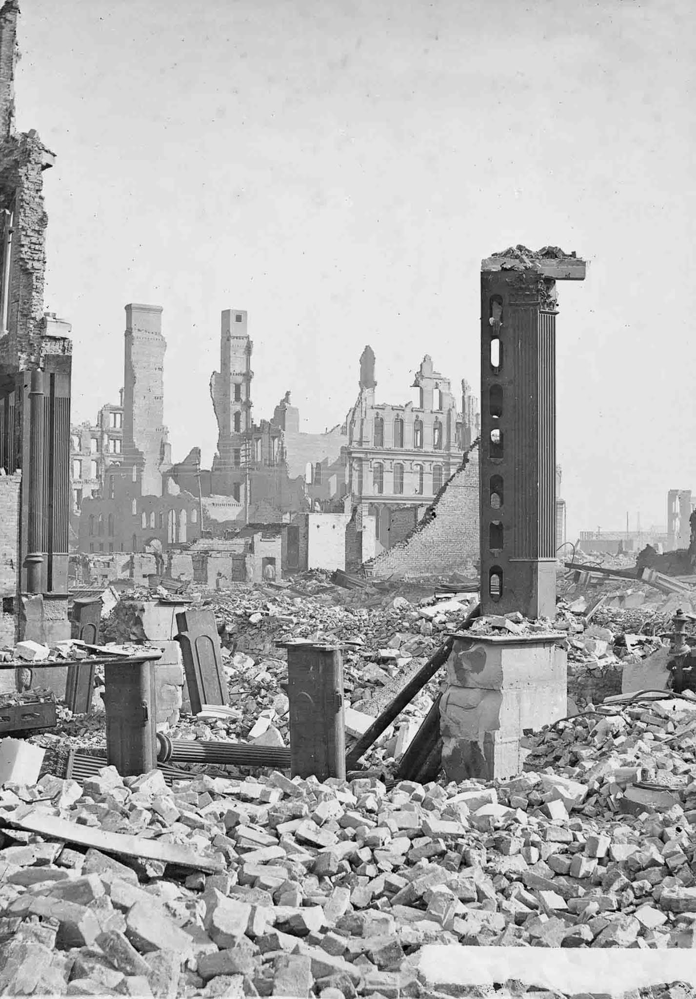 The ruins of the Grand Pacific Hotel and the Honore block, seen from the corner of Dearborn and Monroe Streets.