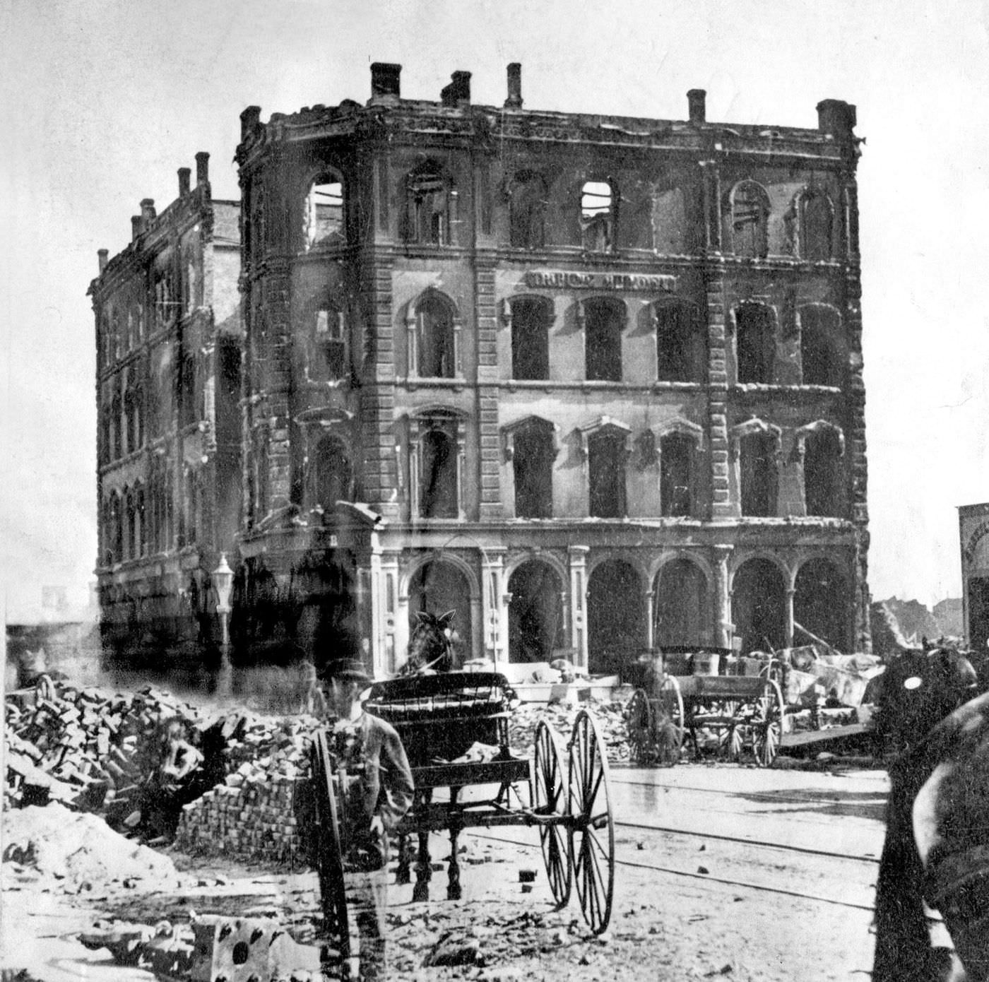 The Chicago Tribune building stands at the southeast corner of Dearborn and Madison streets after the Great Chicago Fire of 1871.