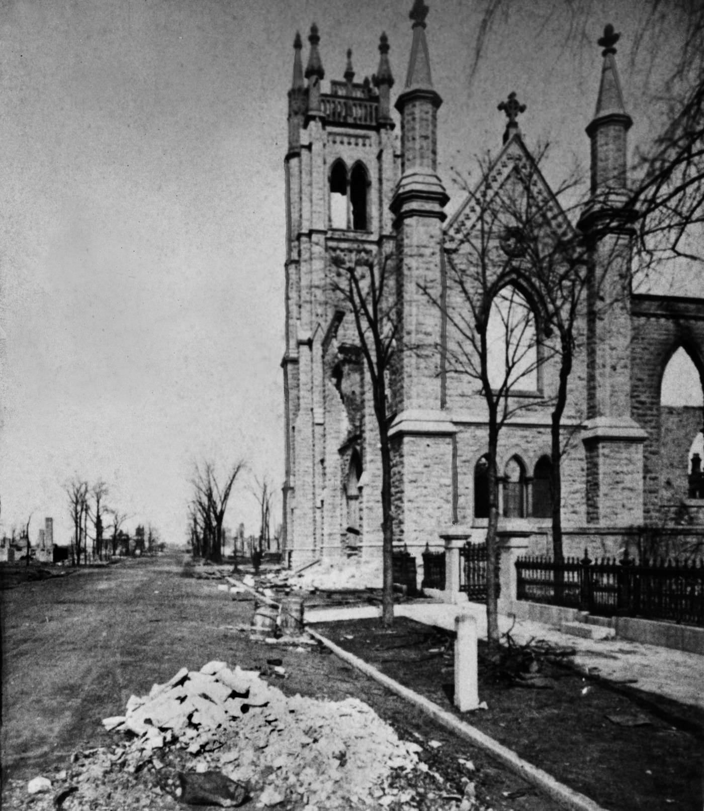 The wreckage of St. James Episcopal Church looking north on Rush Street from Huron Street in the aftermath of the Great Chicago Fire in 1871.