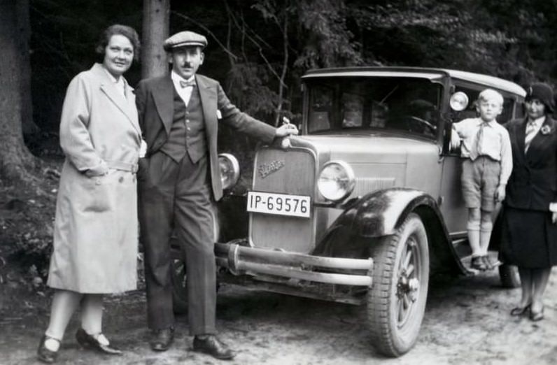 People with Studebaker Cars