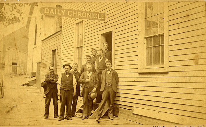 Nine men, presumably the staff of the Daily Chronicle, Olympia, 1880