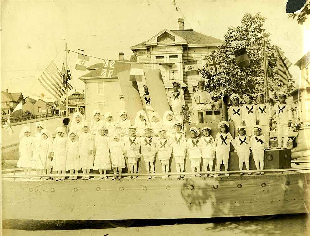 parade float in front of Fujimoto's in Tacoma, 1919