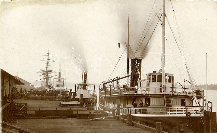 Steam and sailing ships at Tacoma dock, 1890