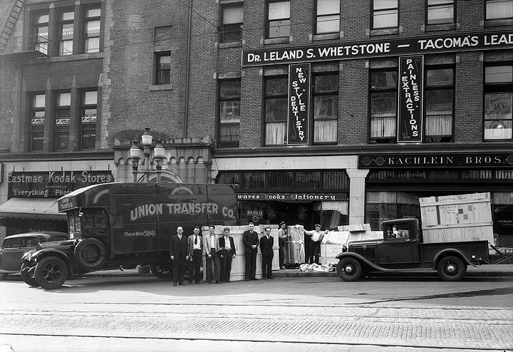 Almog Music Co. [Unloading pianos in front of the store, Tacoma, 1934