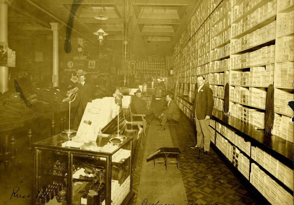 Russ Brown and salesmen at Dickson's Brothers shoe department, 1909