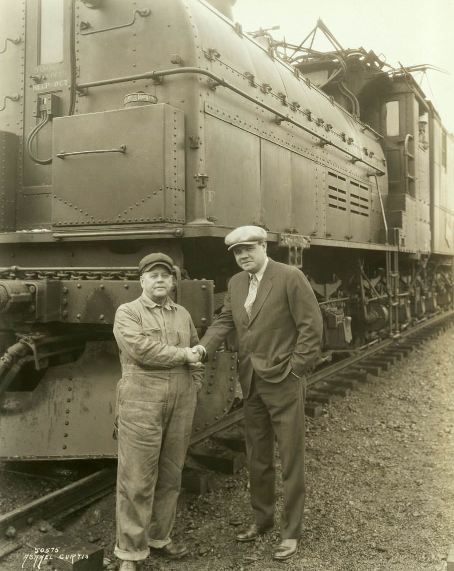 Babe Ruth in front of Milwaukee Road bi-polar locomotive, Tacoma, 1926