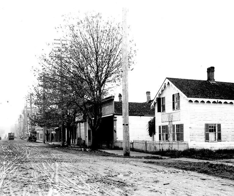 Muddy Main St., Olympia, with streetcar, 1902