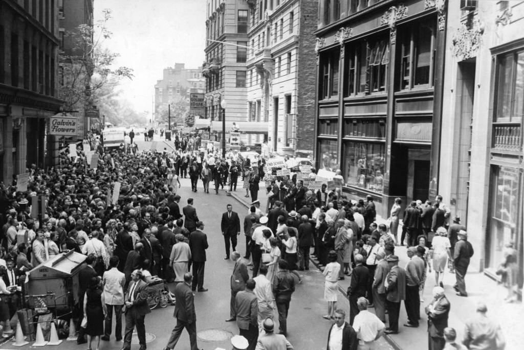 Roughly 1,000 delegates to the Unitarian Universalist General Assembly in session in Boston gather in silent vigil outside the office of the Boston School Committee on May 25, 1965.