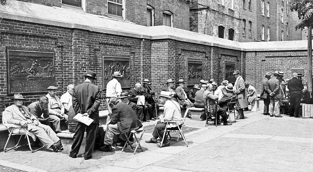 Residents chat and play cards at Boston's Paul Revere Park in the North End on a sunny May 21, 1963.