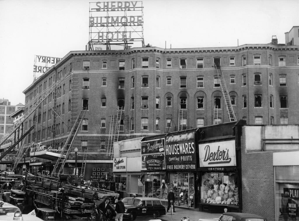 Firefighters work to extinguish a five-alarm fire at the Sherry Biltmore Hotel in Boston, March 29, 1963.