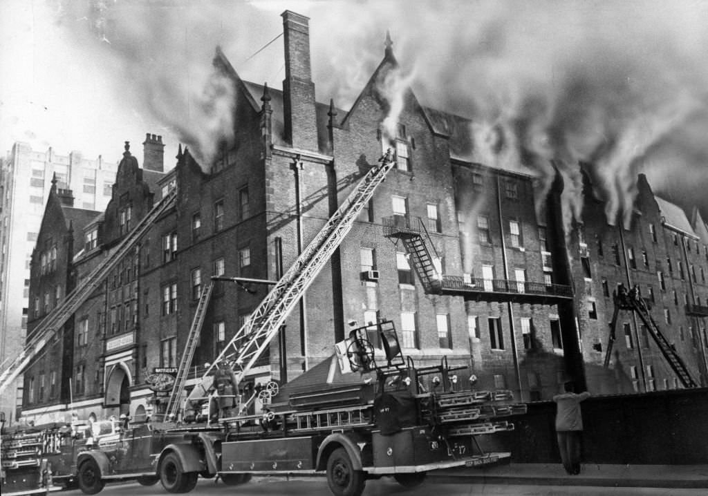 Firefighters battle a two-alarm fire at old Trinity Court on 175 Dartmouth St. in Boston, Feb. 17, 1963.