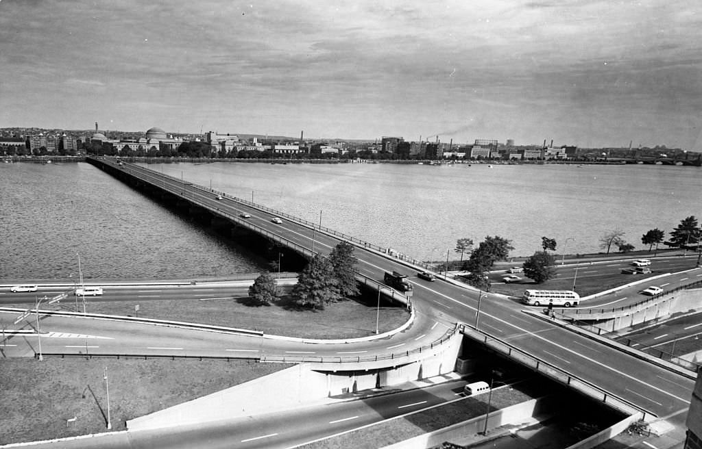 Cars drive over the Harvard Bridge, looking towards Cambridge from Boston, on Oct. 8, 1962.
