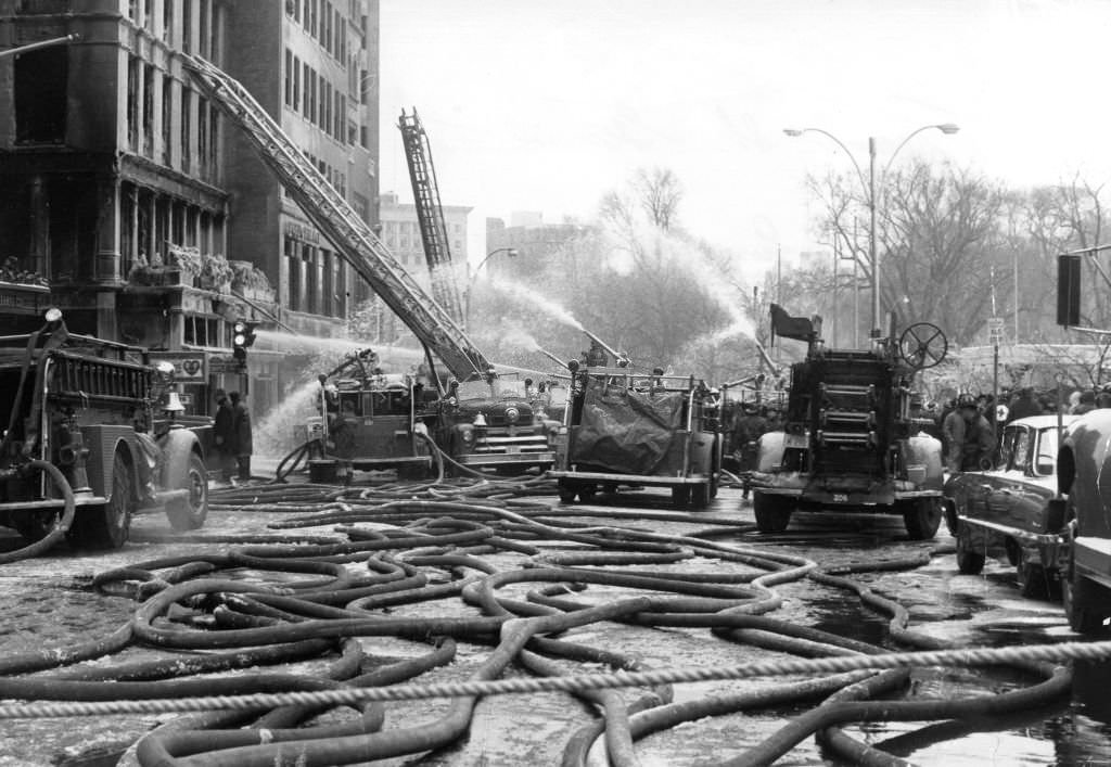 Firefighters work to extinguish a general alarm fire on Tremont Street in Boston, Feb. 18, 1967.