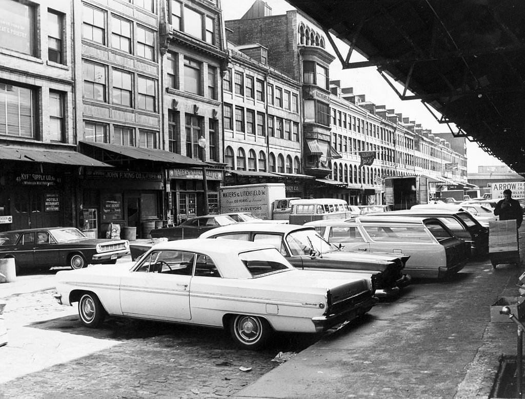 Cars are parked along the sidewalk on North Market Street in Boston on May 3, 1967.