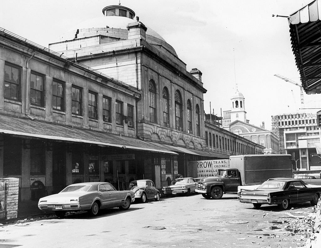 Cars are parked along a street near Faneuil Hall in Boston, May 3, 1967.