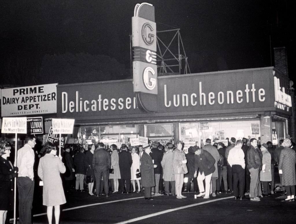 People rally for the election of former Boston Mayor Kevin White on Nov. 6, 1967 at G&G Delicatessen in Boston.