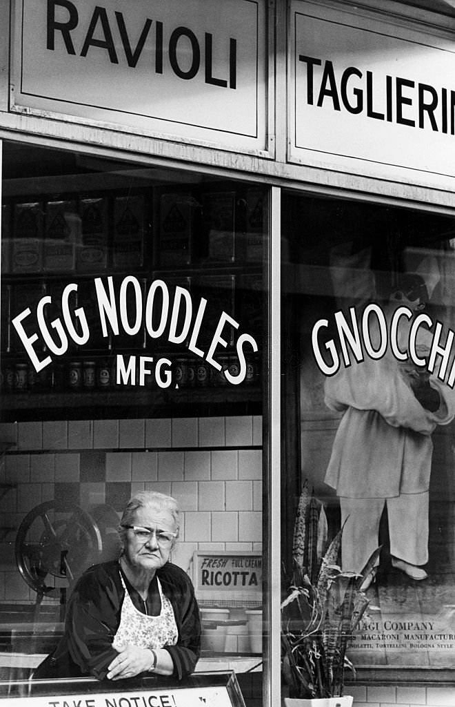 Mrs. Amalia Biagi in the window of her shop in Boston's North End on June 1, 1968.