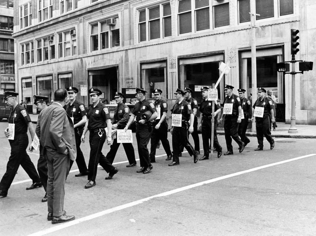Boston police officers picket along Boylston Street at Arlington Street in Boston, June 16, 1969.
