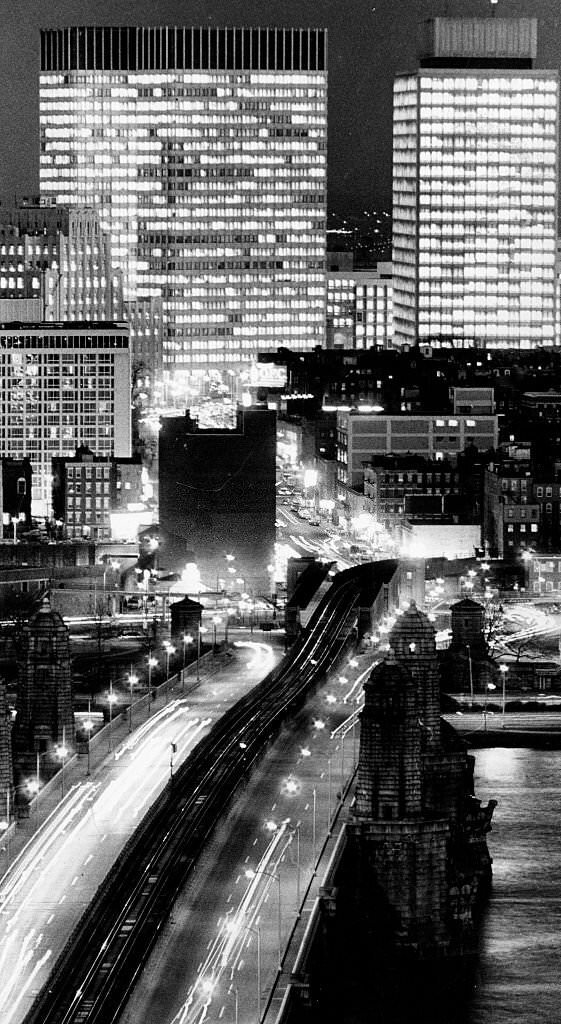 Government Center in Boston is seen in an unusual view from the Cambridge side of the Charles River near the Longfellow Bridge at night on Dec. 5, 1969.