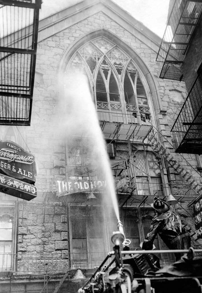 Firefighters battle a blaze at the shuttered Old Howard Theatre in Boston on June 20, 1961.