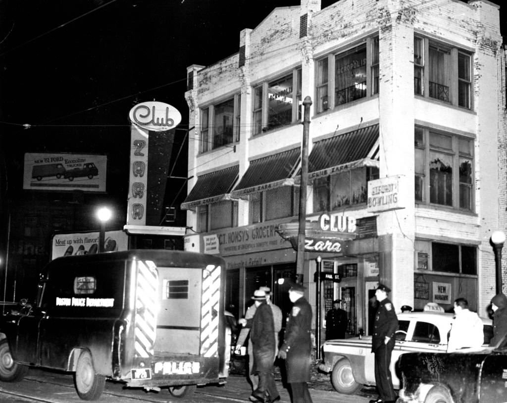 The scene outside of a gambling raid at Club Zara on Tremont Street in Boston, 1961.