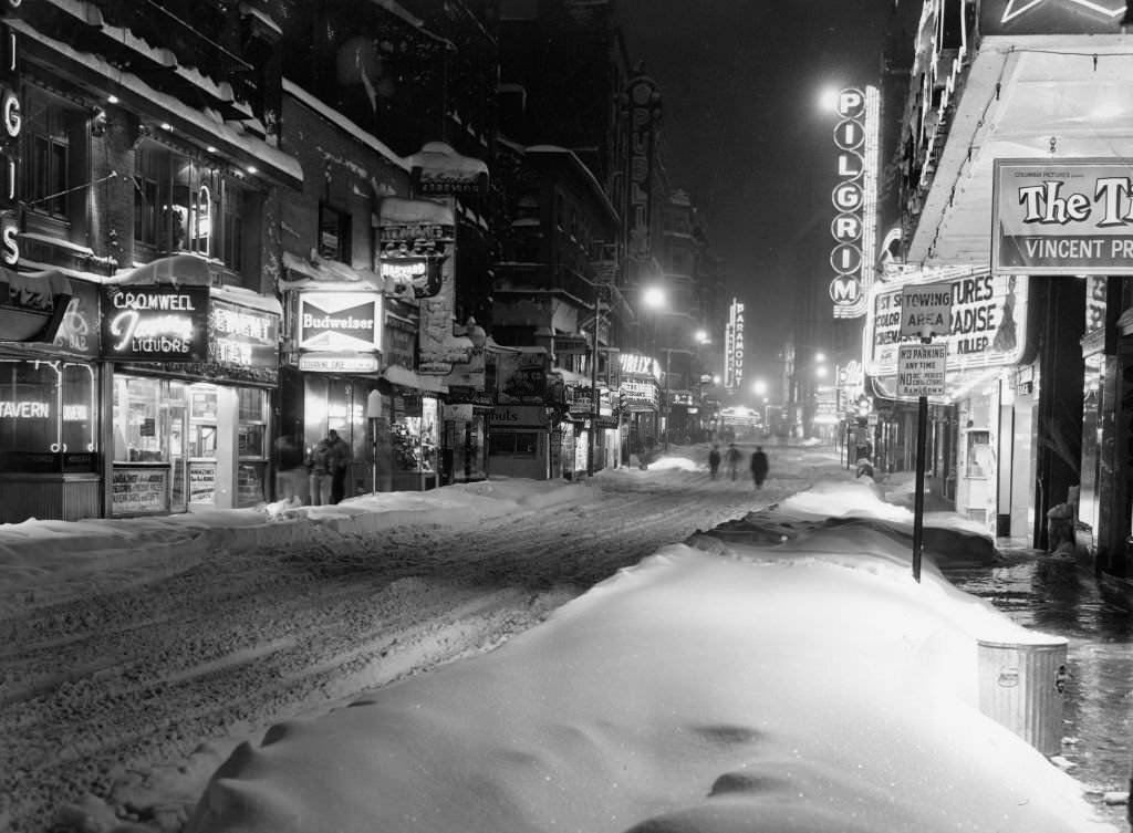 Washington Street in downtown Boston is covered in snow during a snow storm on March 3, 1960.