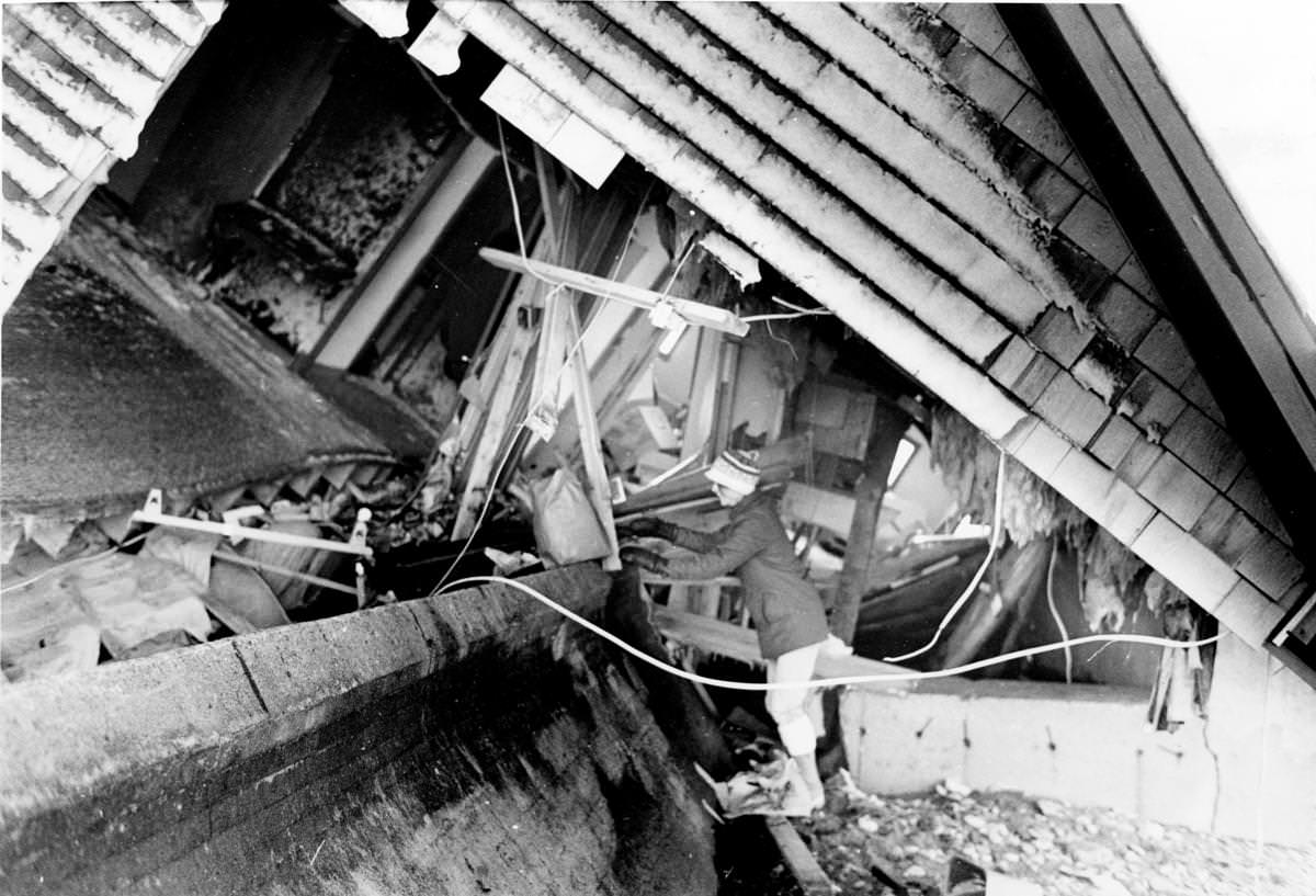 Cathy Silva salvaged belongings from a Minot Beach home on Feb 9.