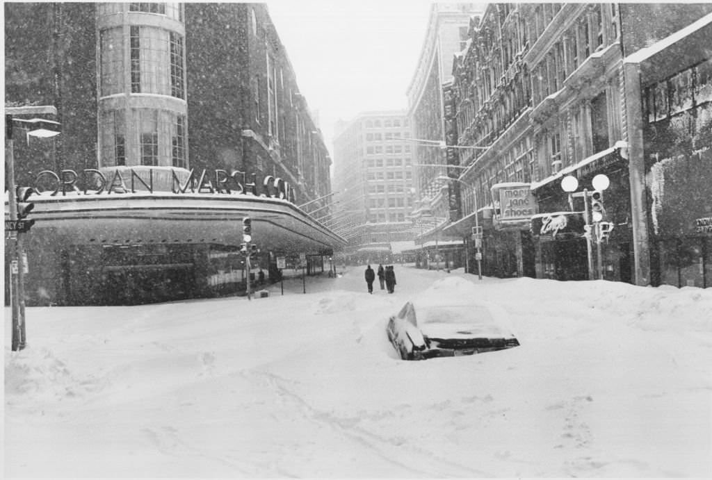 Business in downtown Boston's shopping district - not to mention this lone automobile - ground to a halt during the snow storm Tuesday, during the "Blizzard of 78".