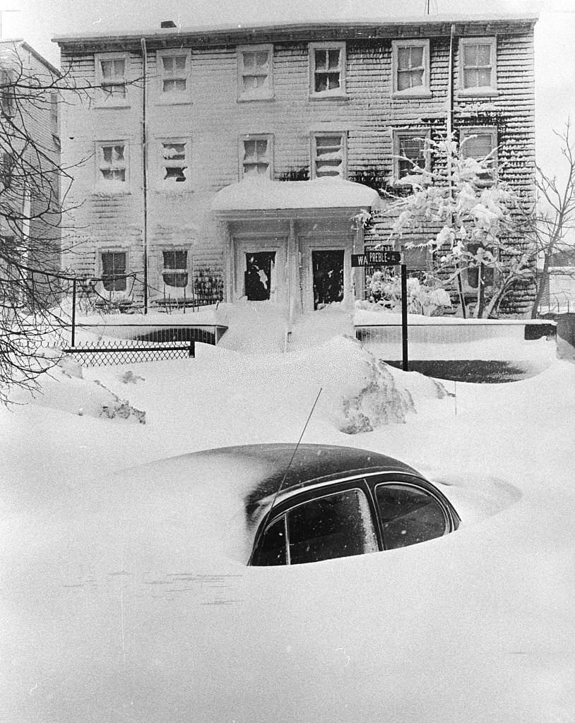 A snow drift on Preble Street near Ward Street in South Boston covers a car up to its windows at 10 a.m. on Feb. 7, 1978.