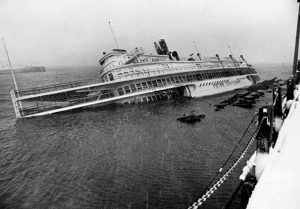 The Peter Stuyvesant, a famous landmark docked by Anthony's Pier 4 in Boston, starts sinking during the "Blizzard of 78".