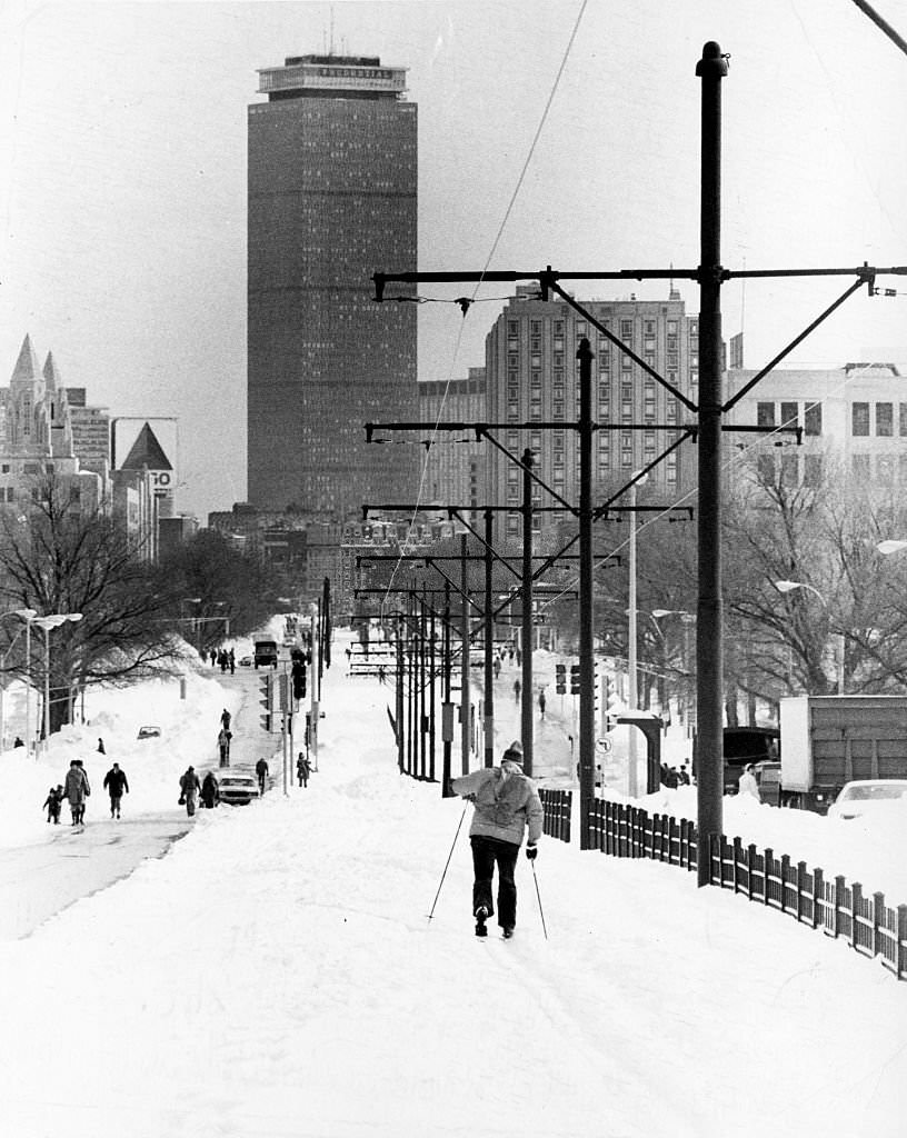 A person skis down the snowy MBTA Green Line tracks on Commonwealth Avenue in Boston on Feb. 9, 1978, during the "Blizzard of 78".