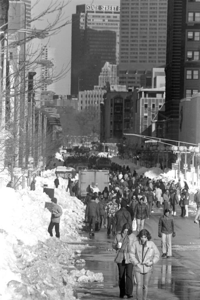 Pedestrians walk up Bolyston Street in Boston in the aftermath of the "Blizzard of 78".