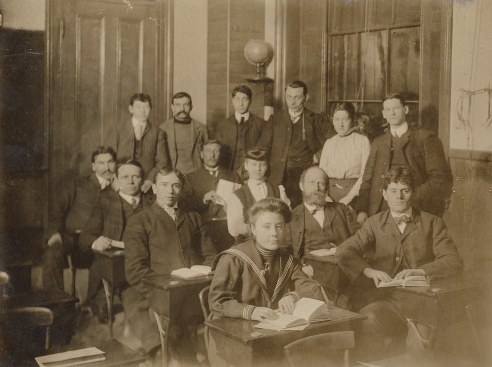 A group of 14 students in a classroom