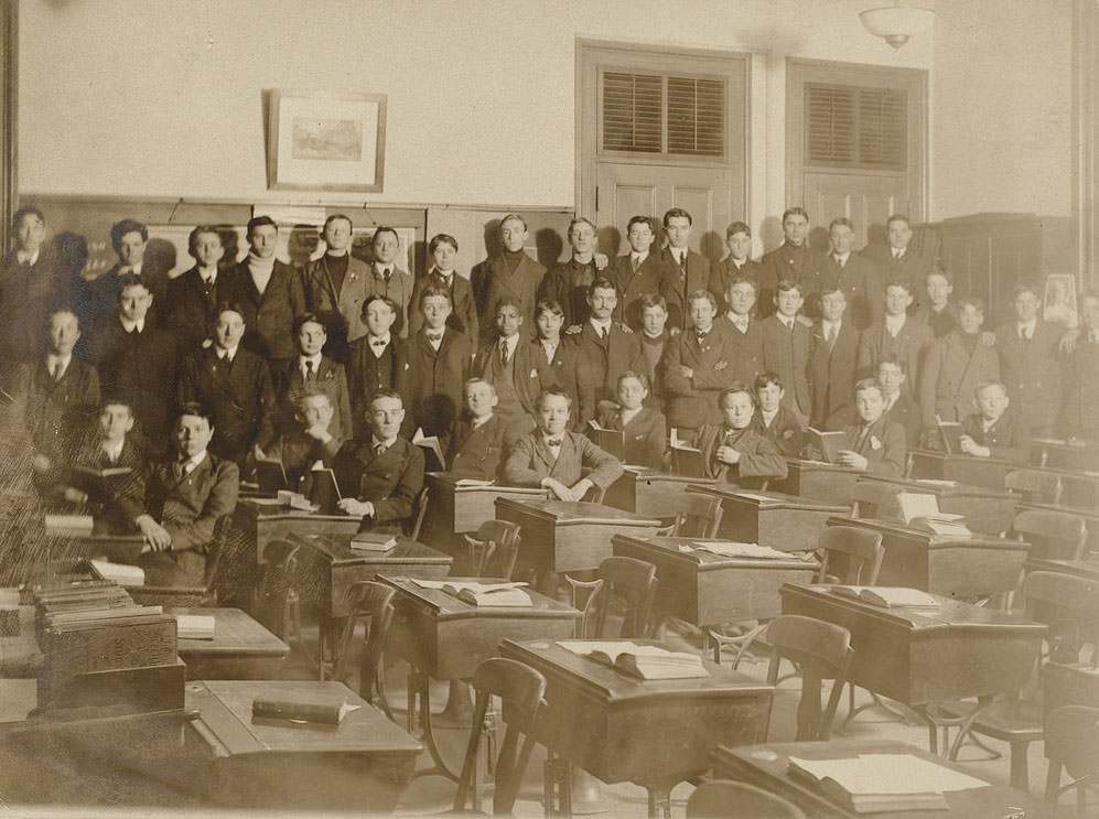 Male students pose for photographing