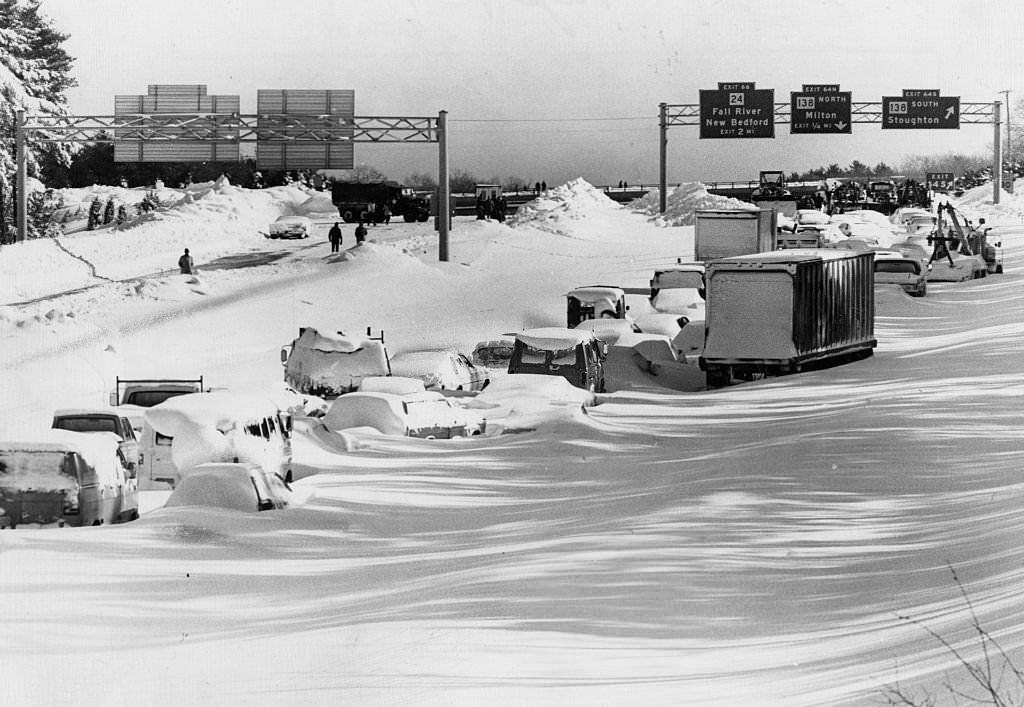 Vehicles are snowbound on Route 128 South in Mass. in the aftermath of a massive blizzard.