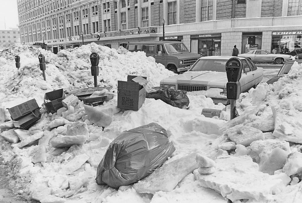 Snow piled high in a street in Boston Massachusetts, after a 21-inch snowfall during the Northeastern United States blizzard of 1978.