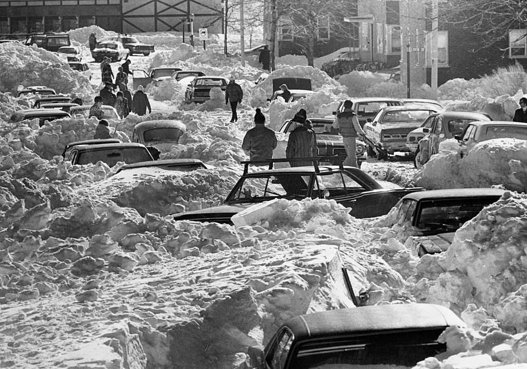 South Boston residents dig their cars out of the snow on Farragut Road, 1978, following a massive storm over the previous weekend.