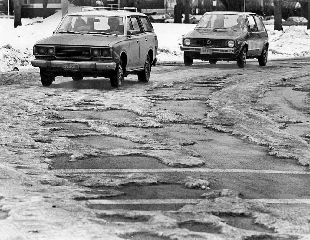 Cars encounter snowy, icy conditions on the roads near the Museum of Fine Arts in Boston's Fenway neighborhood on Jan. 12, 1977.