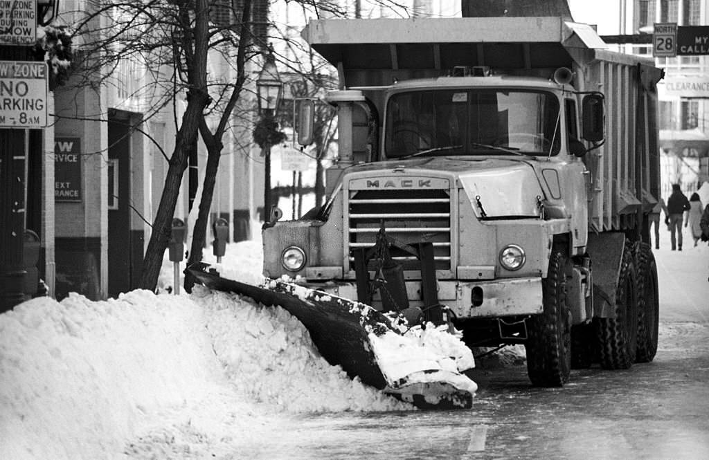 Snow plowing on Charles Street, Beacon Hill, downtown Boston, Massachusetts, 1977.
