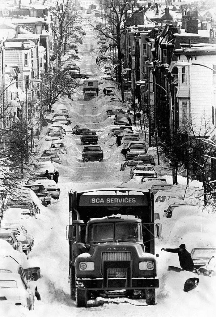 Snow removal on East 6th Street in South Boston after a winter storm, Jan. 13, 1976.