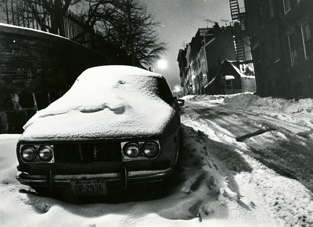 Snow Hill Street in Boston's North End lives up to its name, covered in a layer of fresh snow at 4 a.m., 1975.