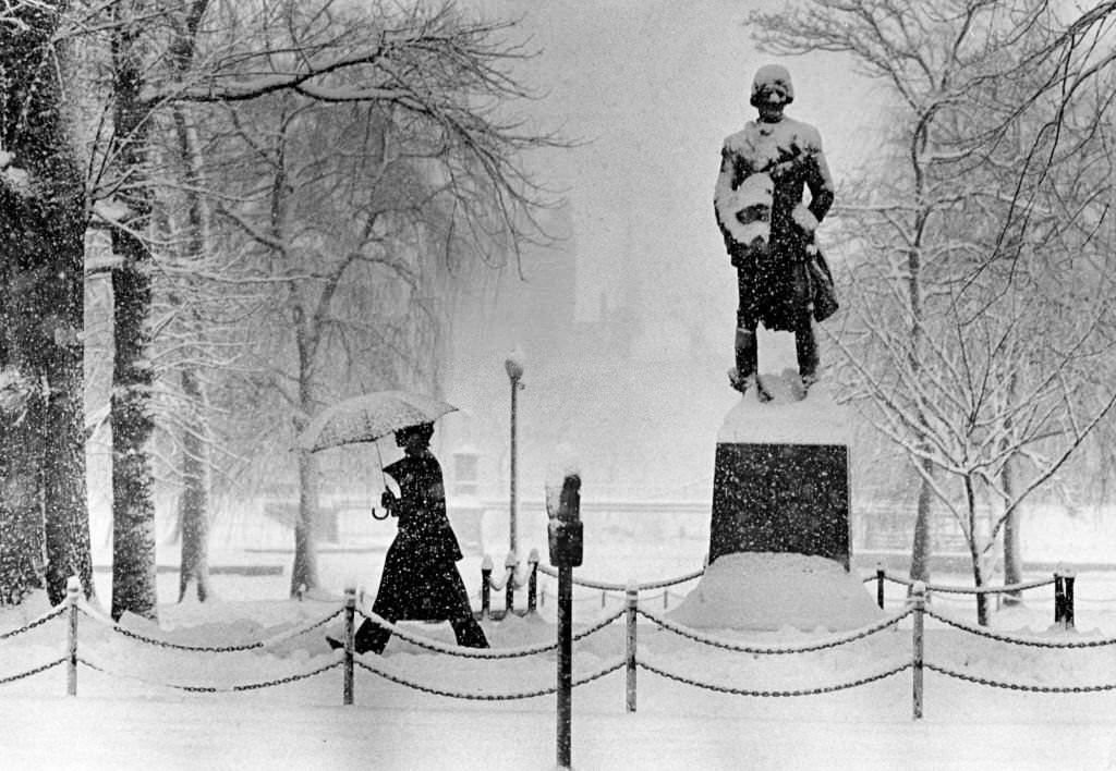 The snowy scene on Boylston Street at Boston's Public Garden during a winter storm, 1975.