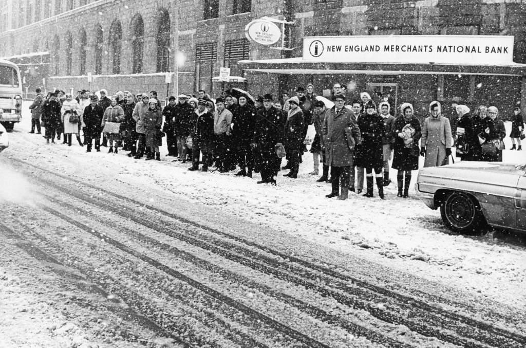 Commuters wait outside South Station in Boston after a snow storm, 1969.