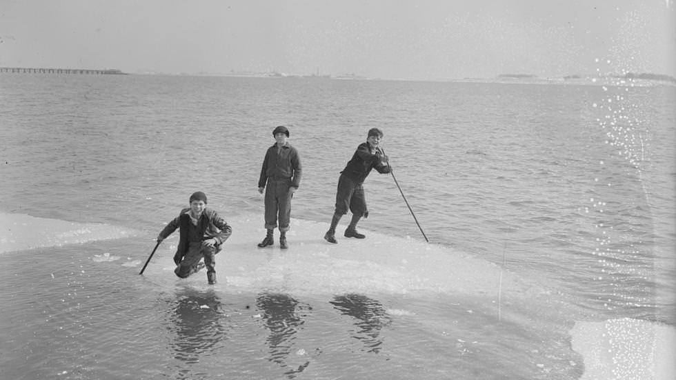 Kids ride ice cakes in Dorchester Bay, 1935